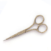 Silver scissors with gemstones for engagement tray